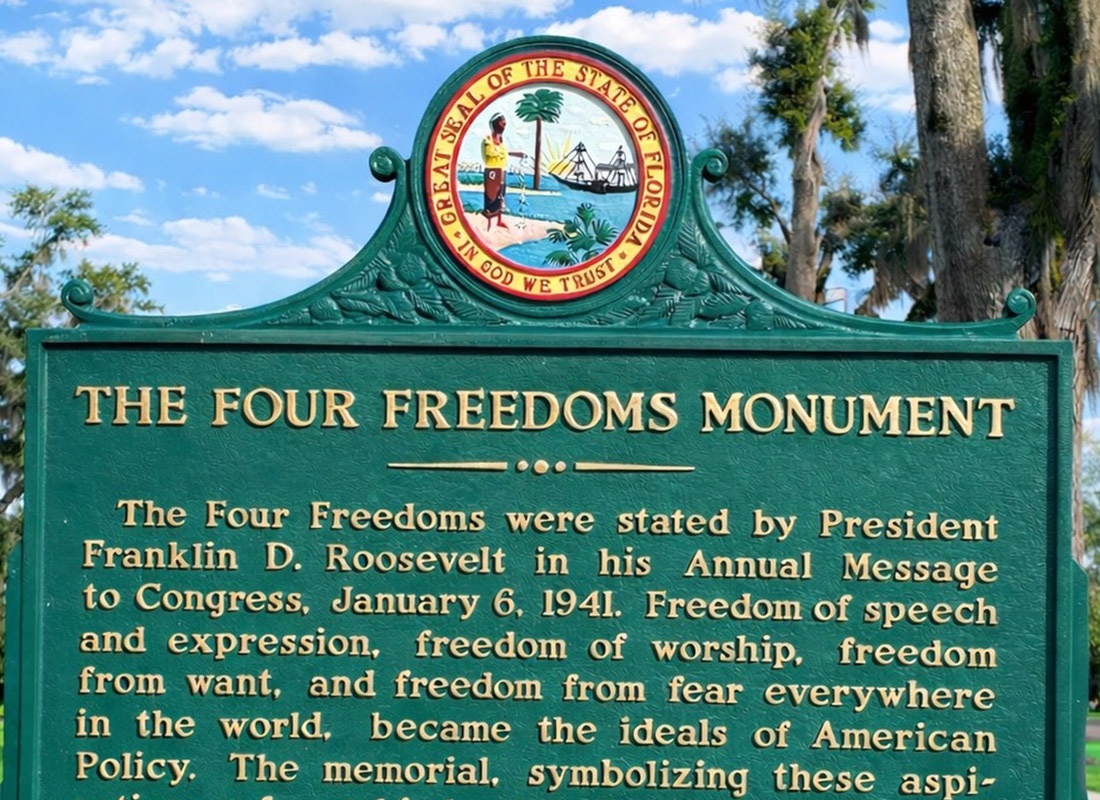 Service Center - Close-up of the Four Freedoms park sign